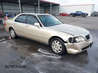 1999 Acura RL with VIN JH4KA9660XC007723, listed as a IAAI auction lot 42039719 with Not provided miles and . Bid and sale history available at DreamBid. Image 1.