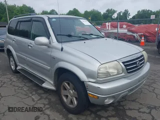 2003 Suzuki XL7 Touring z VIN JS3TX92VX34114737, wystawiony jako IAAI lot #42072909 z przebiegiem 246 655 mil mil oraz . Historia ofert i sprzedaży dostępna na DreamBid. Obrazek 1.
