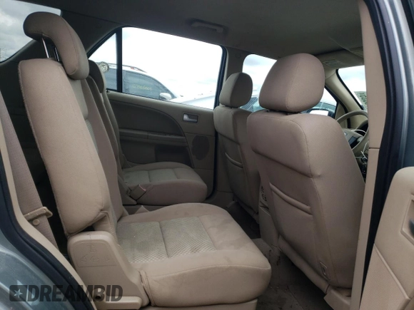 2005 Ford Freestyle SE z VIN 1FMZK011X5GA76053, wystawiony jako Copart lot #42416335 z przebiegiem 243 161 mil mil oraz Szkoda całkowita • Salvage title. Historia ofert i sprzedaży dostępna na DreamBid. Obrazek 11.