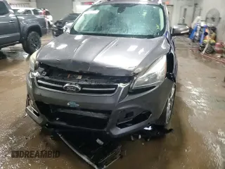 2014 Ford Escape Titanium with VIN 1FMCU9J96EUB44263, listed as a Copart auction lot 50001895 with 242,807 mi miles and Salvage Title. Bid and sale history available at carsss.com. Image 13.