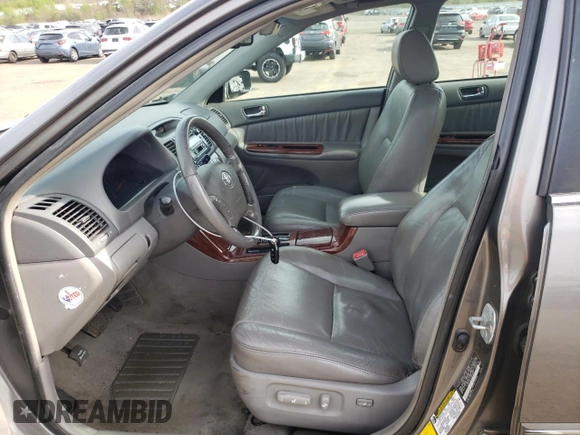 2006 Toyota Camry LE z VIN 4T1BF30K46U628070, wystawiony jako Copart lot #54582755 z przebiegiem 278 805 mil mil oraz Szkoda całkowita • Salvage title. Historia ofert i sprzedaży dostępna na DreamBid. Obrazek 7.
