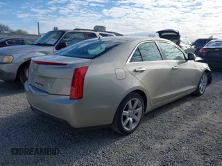 2014 Cadillac ATS Standard RWD z VIN 1G6AA5RA0E0103116, wystawiony jako IAAI lot #42116348 z przebiegiem 133 956 mil mil oraz . Historia ofert i sprzedaży dostępna na DreamBid. Obrazek 4.