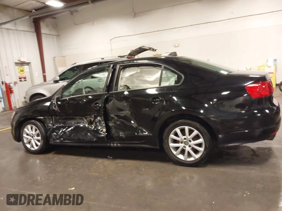2011 Volkswagen Jetta SE z VIN 3VWDZ7AJ0BM362401, wystawiony jako IAAI lot #42549312 z przebiegiem 161 093 mil mil oraz . Historia ofert i sprzedaży dostępna na DreamBid. Obrazek 15.