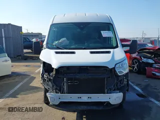 2019 Ford Transit z VIN 1FTYE2CMXKKA07267, wystawiony jako IAAI lot #41436154 z przebiegiem 127 422 mil mil oraz . Historia ofert i sprzedaży dostępna na DreamBid. Obrazek 13.