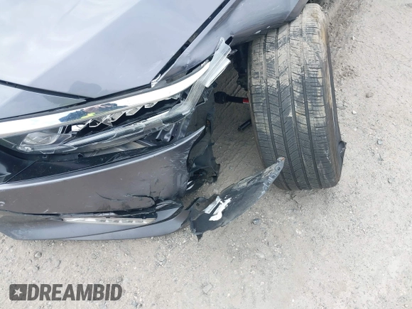 2020 Honda Accord EX with VIN 1HGCV1F4XLA014535, listed as a IAAI auction lot 42001341 with 69,819 mi miles and . Bid and sale history available at DreamBid. Image 16.