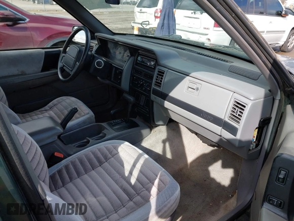 1995 Jeep Grand Cherokee Laredo with VIN 1J4GZ58SXSC676393, listed as a IAAI auction lot 41943464 with 244,317 mi miles. Bid and sale history available at carsss.com. Image 5.