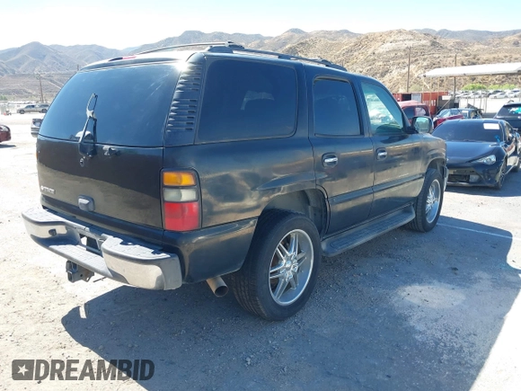 2006 Chevrolet Tahoe LS with VIN 1GNEC13V06R122296, listed as a IAAI auction lot 42712974 with 208,701 mi miles and . Bid and sale history available at DreamBid. Image 4.