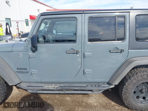 2014 Jeep Wrangler Unlimited Sport with VIN 1C4BJWDG9EL309763, listed as a IAAI auction lot 41378132 with 117,029 mi miles. Bid and sale history available at carsss.com. Image 14.