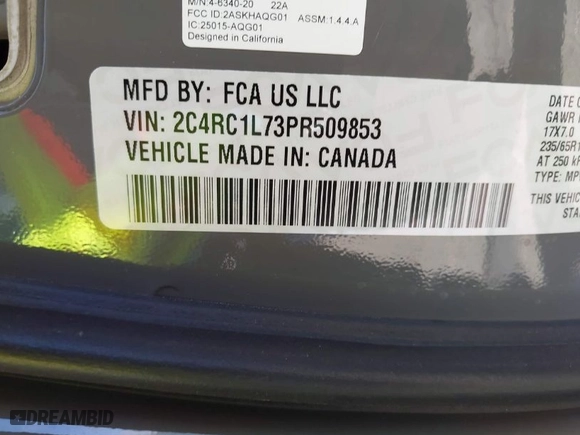 2023 Chrysler Pacifica Hybrid Touring L with VIN 2C4RC1L73PR509853, listed as a IAAI auction lot 41690872 with 83,014 mi miles. Bid and sale history available at carsss.com. Image 9.