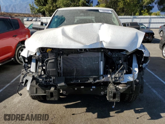 2023 Ram 1500 Tradesman with VIN 1C6RR7FTXPS588759, listed as a Copart auction lot 71082284 with 31,945 mi miles and Salvage title. Bid and sale history available at DreamBid. Image 5.