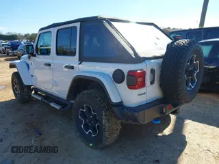 2023 Jeep Wrangler Rubicon with VIN 1C4JJXR64PW586369, listed as a IAAI auction lot 41587561 with 16,038 mi miles and . Bid and sale history available at DreamBid. Image 3.