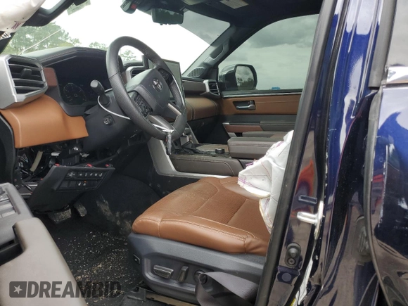 2023 Toyota Tundra 1794 Edition with VIN 5TFMA5AB7PX023918, listed as a Copart auction lot 49638235 with 58,499 mi miles and Salvage title. Bid and sale history available at DreamBid. Image 7.