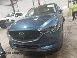 2019 Mazda CX-5 Touring with VIN JM3KFBCM1K0584369, listed as a IAAI auction lot 41657765 with 77,934 mi miles. Bid and sale history available at carsss.com. Image 12.