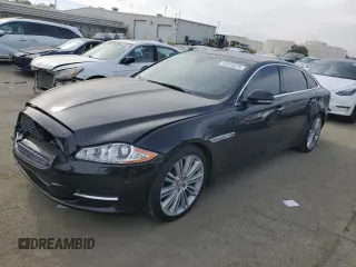 2015 Jaguar XJ with VIN SAJWA2GZ4F8V86379, listed as a Copart auction lot 42624615 with 55,803 mi miles and Salvage Title. Bid and sale history available at carsss.com. Image 1.