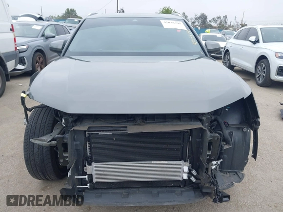 2020 Audi Q3 Premium with VIN WA1AECF32L1061271, listed as a IAAI auction lot 42038795 with 23,902 mi miles and . Bid and sale history available at DreamBid. Image 13.