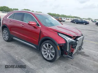 2021 Cadillac XT4 FWD Premium Luxury with VIN 1GYFZCR41MF043072, listed as a IAAI auction lot 41769251 with 31,053 mi miles. Bid and sale history available at carsss.com. Image 1.