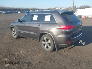 2015 Jeep Grand Cherokee Overland with VIN 1C4RJFCT3FC725239, listed as a IAAI auction lot 41779555 with 100,837 mi miles. Bid and sale history available at carsss.com. Image 3.