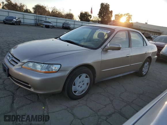 2001 Honda Accord LX z VIN 1HGCG16461A067174, wystawiony jako Copart lot #87543245 z przebiegiem 148 410 mil mil oraz Czysty tytuł • Clean title. Historia ofert i sprzedaży dostępna na DreamBid. Obrazek 1.