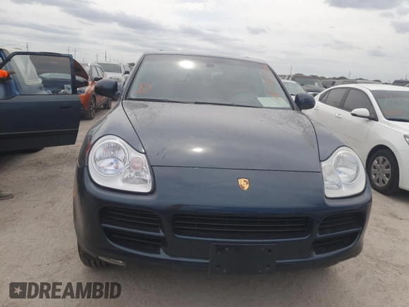 2004 Porsche Cayenne S with VIN WP1AB29P64LA65724, listed as a Copart auction lot 76743364 with 99,830 mi miles and Salvage Title. Bid and sale history available at carsss.com. Image 5.