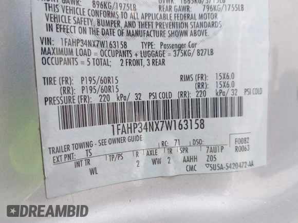 2007 Ford Focus S z VIN 1FAHP34NX7W163158, wystawiony jako IAAI lot #42586421 z przebiegiem 123 131 mil mil oraz . Historia ofert i sprzedaży dostępna na DreamBid. Obrazek 9.