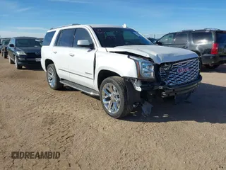 2020 GMC Yukon Denali with VIN 1GKS2CKJ3LR260455, listed as a IAAI auction lot 41690495 with 92,498 mi miles. Bid and sale history available at carsss.com. Image 1.