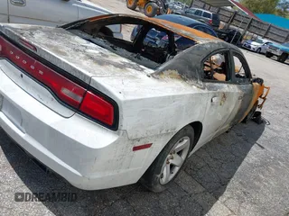 2014 Dodge Charger Police with VIN 2C3CDXAT0EH121251, listed as a IAAI auction lot 41940120 with Not Provided miles and . Bid and sale history available at DreamBid. Image 4.