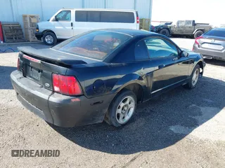 2004 Ford Mustang Standard with VIN 1FAFP40604F156534, listed as a IAAI auction lot 41794486 with 216,207 mi miles. Bid and sale history available at carsss.com. Image 4.