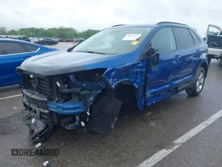 2024 Ford Edge SE z VIN 2FMPK4G93RBA72662, wystawiony jako IAAI lot #42097425 z przebiegiem 7 234 mil mil oraz . Historia ofert i sprzedaży dostępna na DreamBid. Obrazek 2.