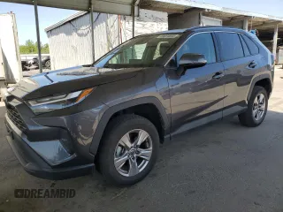 2022 Toyota RAV4 XLE with VIN 2T3W1RFV9NW203969, listed as a Copart auction lot 59034695 with 89,999 mi miles and Salvage title. Bid and sale history available at DreamBid. Image 1.