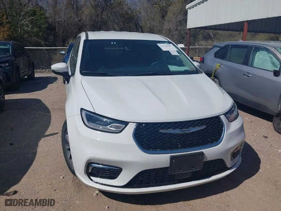 2023 Chrysler Pacifica Hybrid Touring L with VIN 2C4RC1L74PR579720, listed as a IAAI auction lot 41762445 with 38,095 mi miles. Bid and sale history available at carsss.com. Image 6.