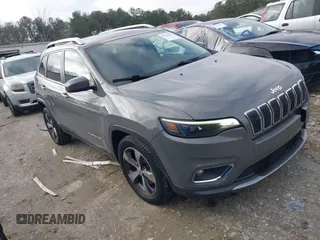 2020 Jeep Cherokee Limited with VIN 1C4PJLDBXLD502858, listed as a IAAI auction lot 41148184 with 73,509 mi miles. Bid and sale history available at carsss.com. Image 1.
