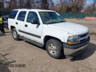 2005 Chevrolet Tahoe LS with VIN 1GNEK13T65J198121, listed as a IAAI auction lot 41826459 with 233,718 mi miles. Bid and sale history available at carsss.com. Image 1.