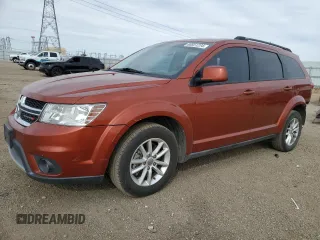 2013 Dodge Journey SXT with VIN 3C4PDCBG9DT710666, listed as a Copart auction lot 86851234 with 165,171 mi miles and Salvage title. Bid and sale history available at DreamBid. Image 1.