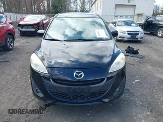 2012 Mazda 5 Touring with VIN JM1CW2CL8C0111574, listed as a IAAI auction lot 41999112 with 126,963 mi miles and . Bid and sale history available at DreamBid. Image 12.