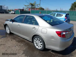 2014 Toyota Camry Hybrid LE with VIN 4T1BD1FK0EU112479, listed as a IAAI auction lot 41901348 with 91,440 mi miles. Bid and sale history available at carsss.com. Image 3.