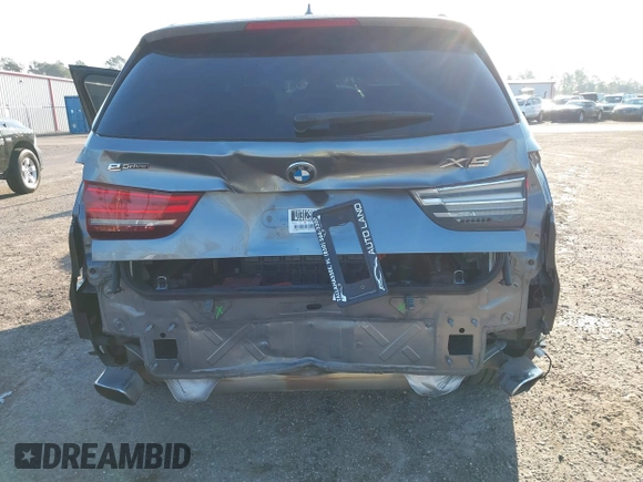2016 BMW X5 xDrive40e with VIN 5UXKT0C57G0S75476, listed as a IAAI auction lot 41642249 with 105,489 mi miles and . Bid and sale history available at DreamBid. Image 6.