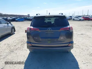 2016 Toyota RAV4 LE with VIN 2T3BFREV6GW482446, listed as a IAAI auction lot 41879439 with 144,693 mi miles. Bid and sale history available at carsss.com. Image 17.
