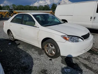 2002 Toyota Camry LE z VIN 4T1BE32K12U055722, wystawiony jako Copart lot #56522495 z przebiegiem 256 565 mil mil oraz Szkoda całkowita • Salvage title. Historia ofert i sprzedaży dostępna na DreamBid. Obrazek 4.