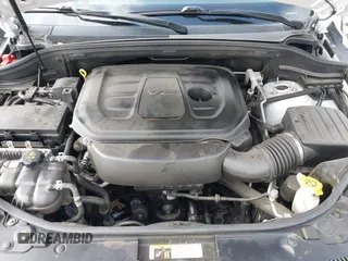 2020 Jeep Grand Cherokee Laredo E with VIN 1C4RJEAG4LC245884, listed as a IAAI auction lot 42564754 with 63,356 mi miles and . Bid and sale history available at DreamBid. Image 10.