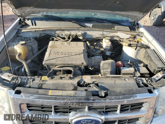 2011 Ford Escape Limited with VIN 1FMCU9EG2BKA74440, listed as a Copart auction lot 61081835 with 136,933 mi miles and Salvage title. Bid and sale history available at DreamBid. Image 12.