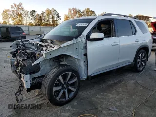 2024 Honda Pilot Touring z VIN 5FNYG2H76RB012681, wystawiony jako Copart lot #71038924 z przebiegiem Nie podano mil oraz Szkoda całkowita • Salvage title. Historia ofert i sprzedaży dostępna na DreamBid. Obrazek 1.