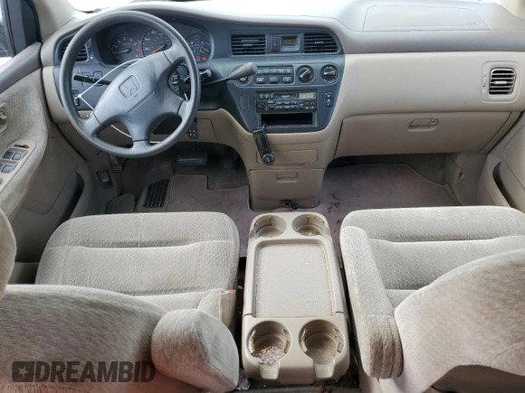 2000 Honda Odyssey LX z VIN 2HKRL1850YH575430, wystawiony jako Copart lot #53260255 z przebiegiem 188 847 mil mil oraz Szkoda całkowita • Salvage title. Historia ofert i sprzedaży dostępna na DreamBid. Obrazek 8.