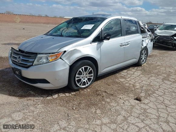 2012 Honda Odyssey EX-L with VIN 5FNRL5H64CB136514, listed as a IAAI auction lot 41837755 with 175,844 mi miles. Bid and sale history available at carsss.com. Image 2.