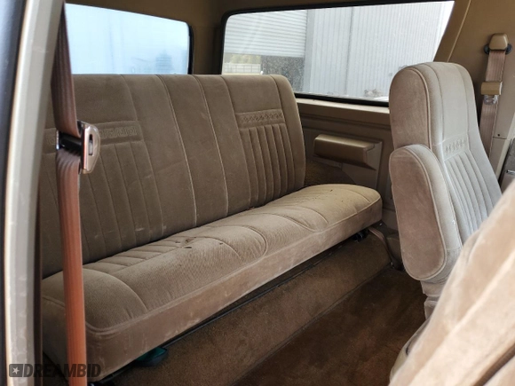 1987 Ford Bronco Custom with VIN 1FMEU15H6HLA11430, listed as a Copart auction lot 89069465 with 2,155 mi miles and Salvage Title. Bid and sale history available at carsss.com. Image 10.