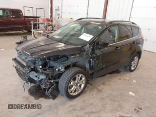 2014 Ford Escape SE with VIN 1FMCU9G95EUA16328, listed as a IAAI auction lot 42464235 with 108,570 mi miles and . Bid and sale history available at DreamBid. Image 2.