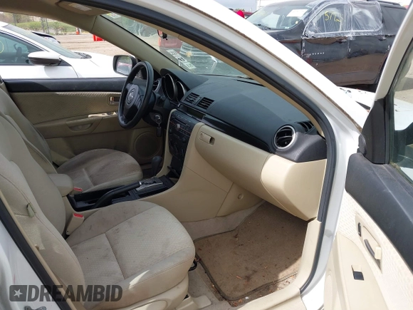 2006 Mazda 3 i Touring with VIN JM1BK32F161401419, listed as a IAAI auction lot 42261618 with 96,772 mi miles and . Bid and sale history available at DreamBid. Image 5.