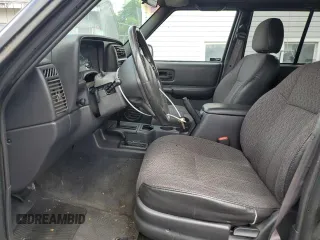 2000 Jeep Cherokee Classic with VIN 1J4FF58S8YL119611, listed as a Copart auction lot 57255685 with 148,908 mi miles and Clean title. Bid and sale history available at DreamBid. Image 7.