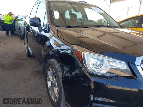 2018 Subaru Forester Touring z VIN JF2SJAWC2JH407593, wystawiony jako IAAI lot #42014886 z przebiegiem 78 349 mil mil oraz . Historia ofert i sprzedaży dostępna na DreamBid. Obrazek 19.