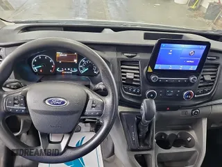 2020 Ford Transit Cargo with VIN 1FTBR2YG6LKA84460, listed as a IAAI auction lot 42839917 with 129,041 mi miles and . Bid and sale history available at DreamBid. Image 47.