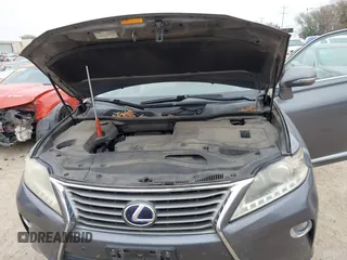 2013 Lexus RX 450h with VIN JTJBC1BA0D2440528, listed as a IAAI auction lot 41591177 with 156,869 mi miles and . Bid and sale history available at DreamBid. Image 10.